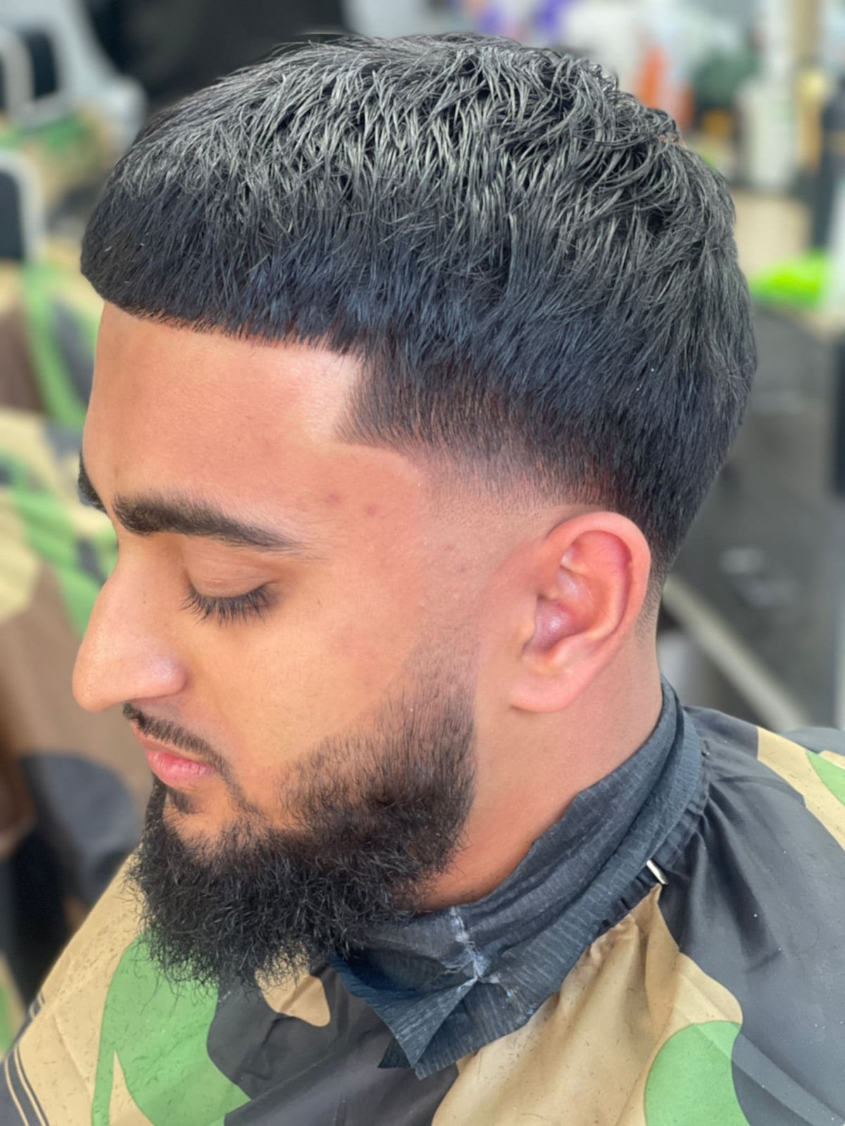Modern barbershop interior with neon lighting